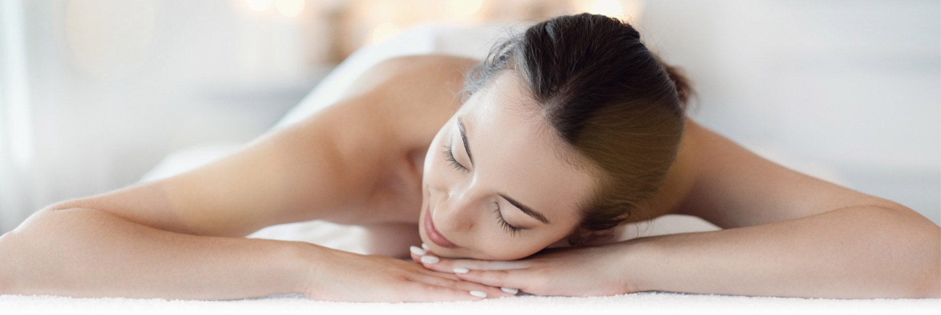 Massage bien-être à domicile dans une ambiance douce et apaisante